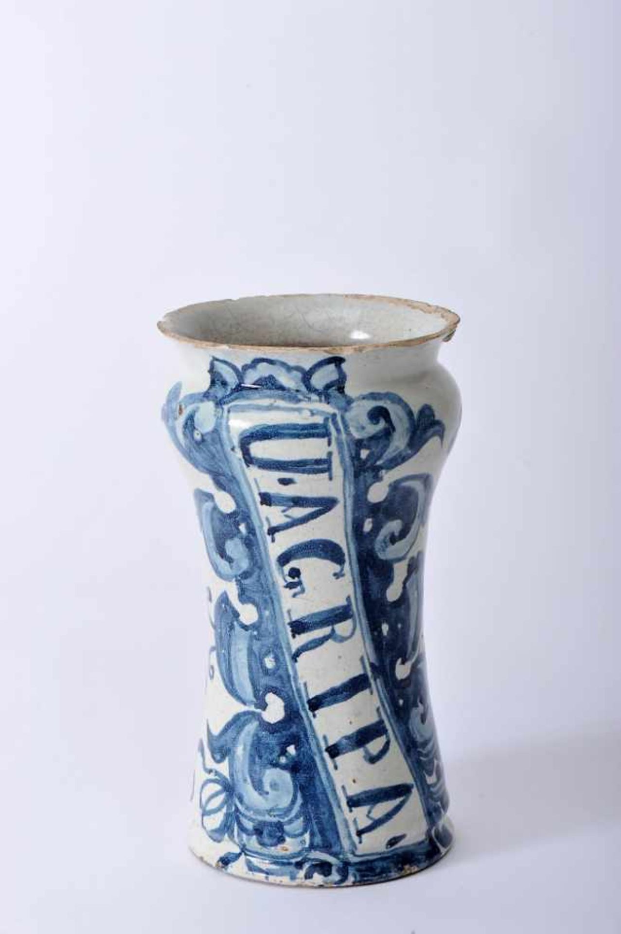 A Pharmacy PotA Pharmacy Pot, faience, blue «Barroque cartouche» decoration, band with inscription