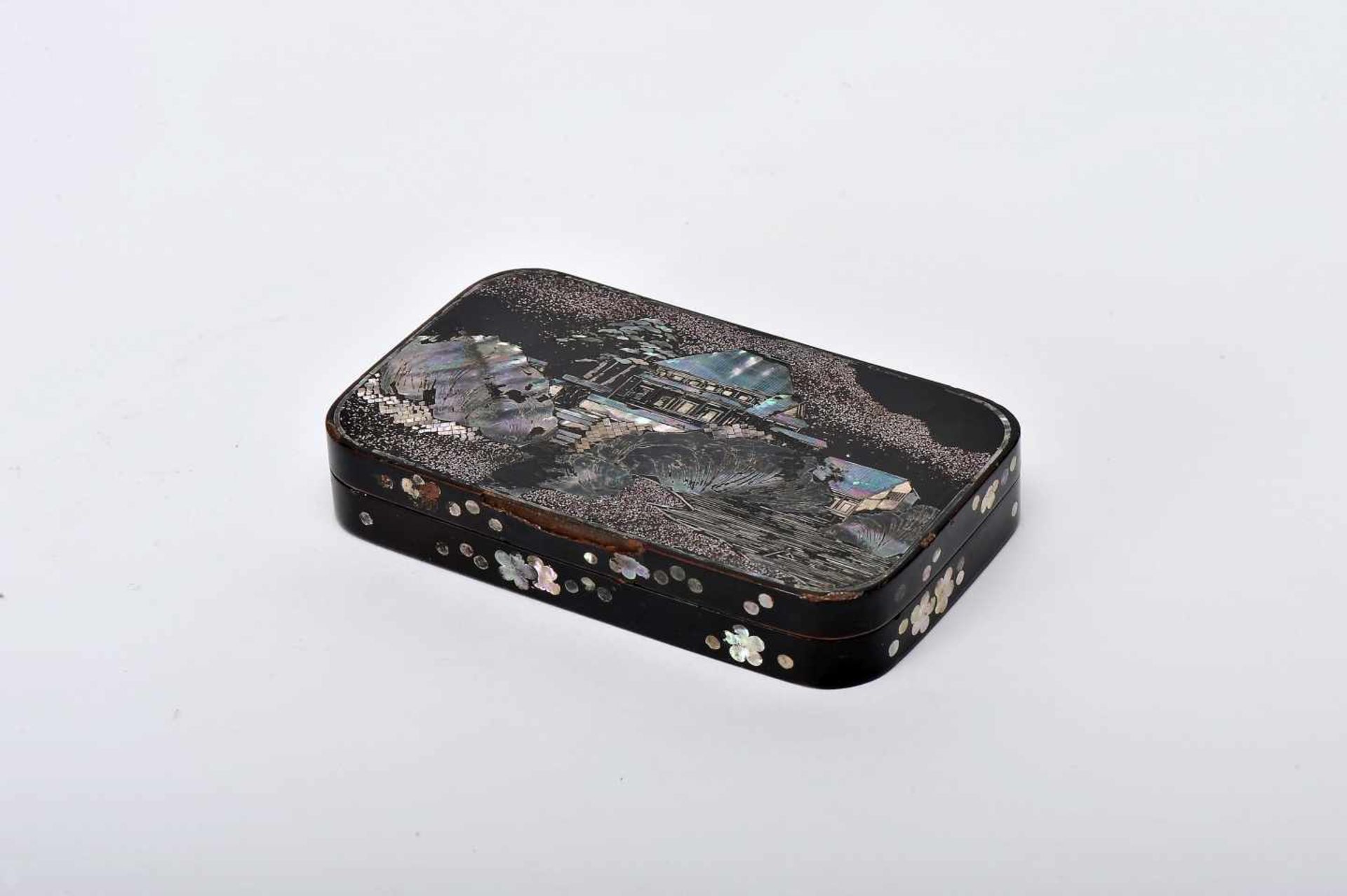 A Tobacco CaseA Tobacco Case, brass entirely coated with black lacquer and mother-of-pearl "