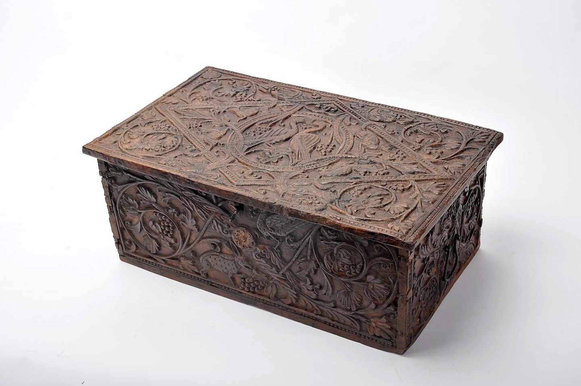 A Small ChestA Small Chest, red anjili wood with traces of polychromy, low-relief decoration "