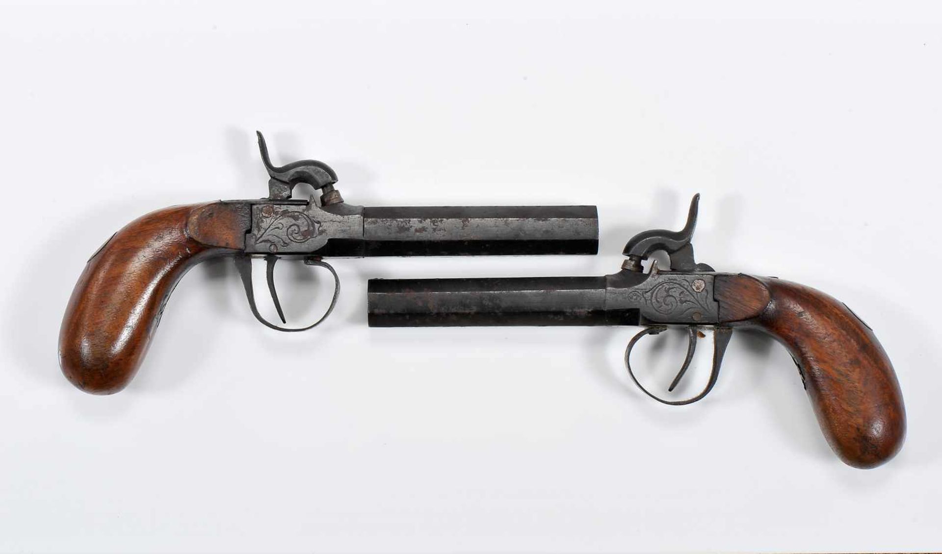 A pair of box-lock percussion pistols