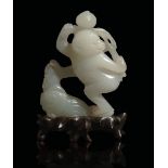 A white jade group, China, Qing Dynasty, 1800s - H 7cm -