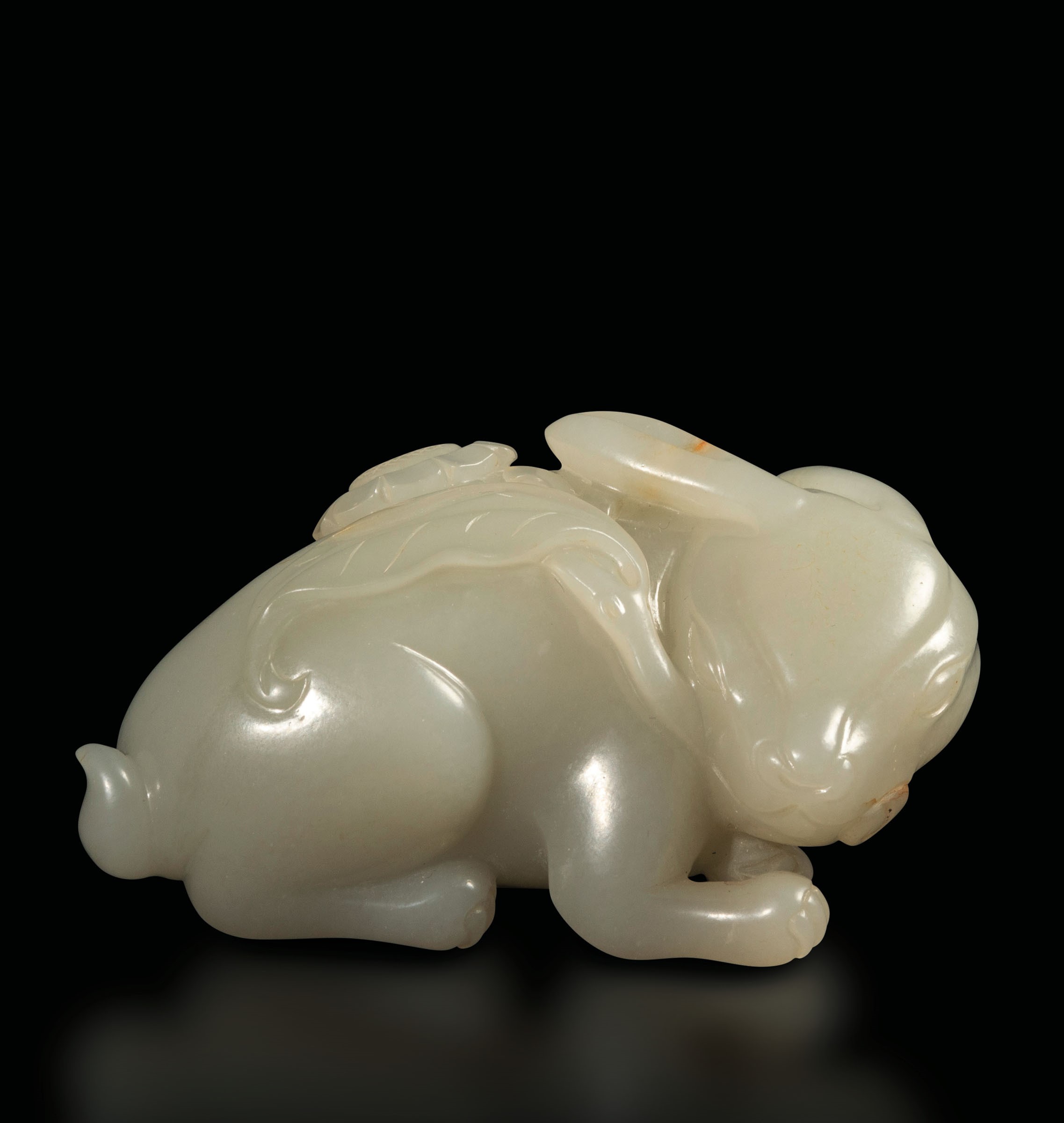 A small Celadon jade group, China, Qing Dynasty - 19th century. 8x5cm -