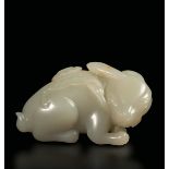 A small Celadon jade group, China, Qing Dynasty - 19th century. 8x5cm -