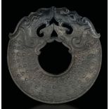 A jade disk, China, Ming Dynasty - Dragon head details and decors. 17th century. Diam [...]