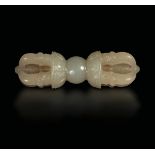 A white jade Vajra, China, Qing Dynasty - 19th century. 4cm -