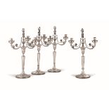 4 silver two-branched candlesticks, 1900s - Molten silver, Italian silverware, marks [...]