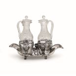 A silver cruet stand, France, late 1700s - Molten, embossed and chiselled silver with [...]