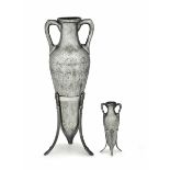 A silver amphora and small amphora, 1900s, Milan - Two vases with a tripod support in [...]