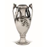 A silver vase, Germany, 1910 - An Art Nouveau vase in molten, embossed and chiselled [...]