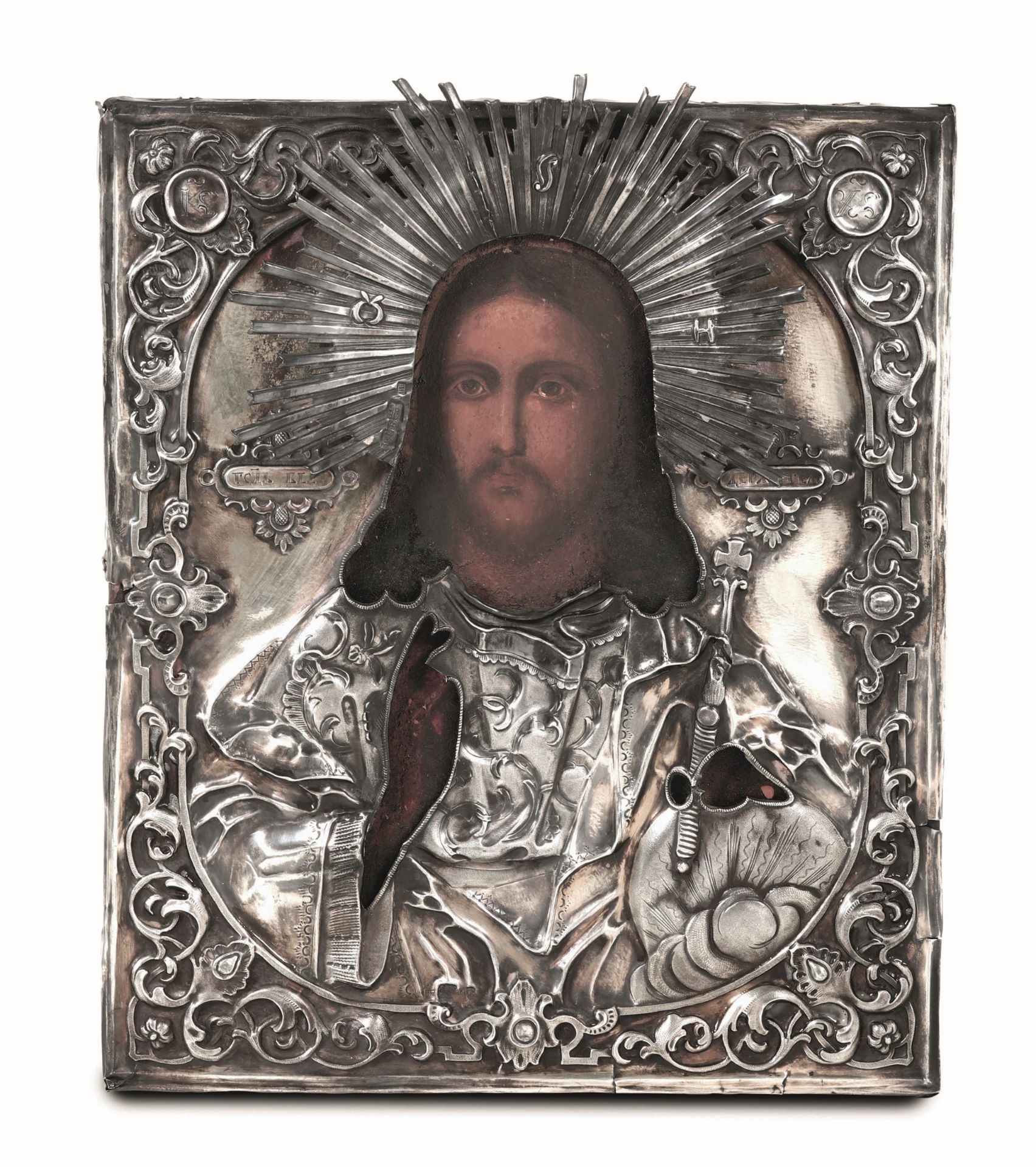 An icon with silver riza, Russia 1800s - Molten, embossed and chiselled silver. [...]