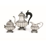 A silver tea set, Naples, 18/1900s - Molten, embossed and chiselled silver. It [...]