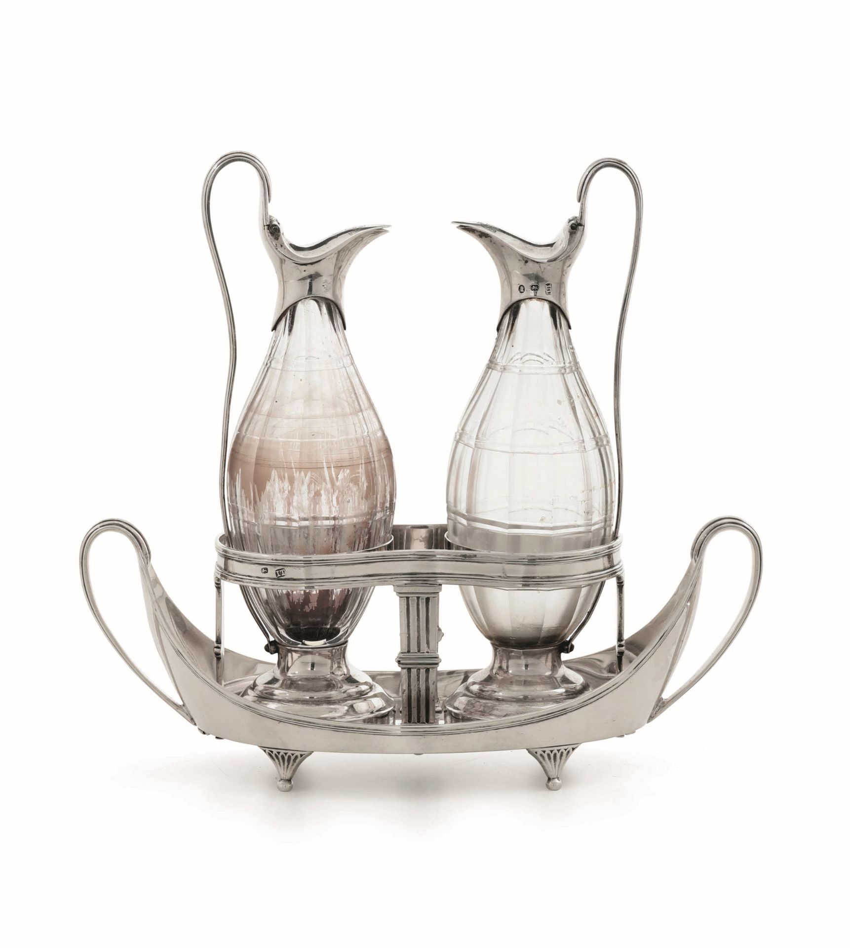 A silver cruet stand, J. Tweedie (?) - London 1790. Molten, embossed and chiselled [...]