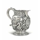 A silver pitcher, W. Brown, London 1821 - Embossed and chiselled silver. 325gr, H 14cm -