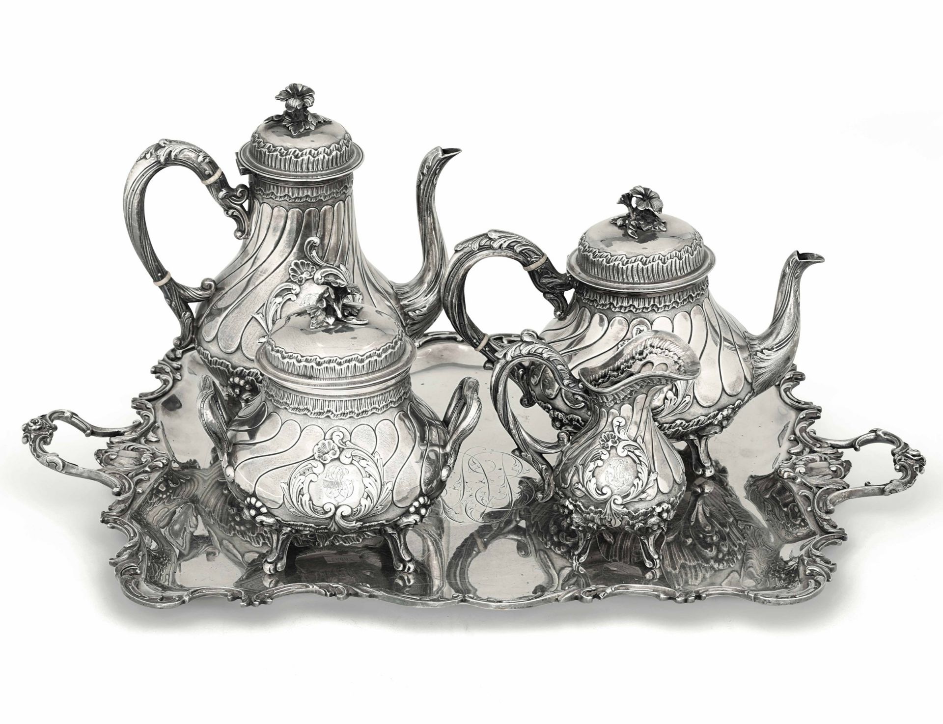 A silver set, Veyrat, France 1800s - Molten, embossed and chiselled silver. 3730gr, [...]