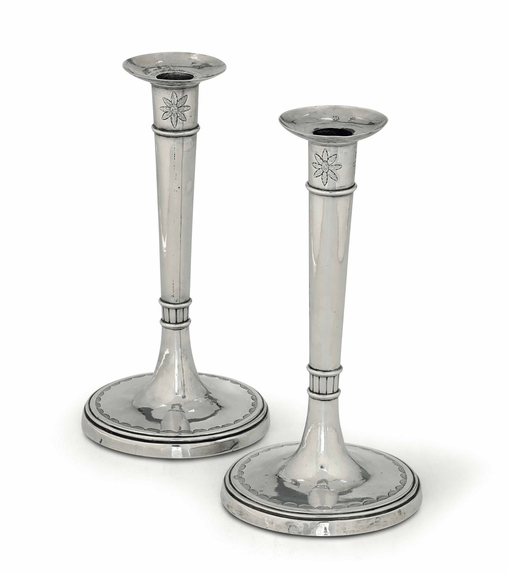 Two candlesticks, Rome, 1800s, V. Torre - 405gr, H. 23.5cm, base diam. 12cm. -
