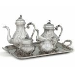 A tea and coffee set with tray, 1900s, Italy - A set with tray in molten and [...]