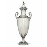 A silver vase, 1900s, Milan - Molten and chiselled silver, made by the Cacchione [...]