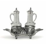A silver cruet stand, Paris, early 1800s - Molten, embossed and chiselled first title [...]