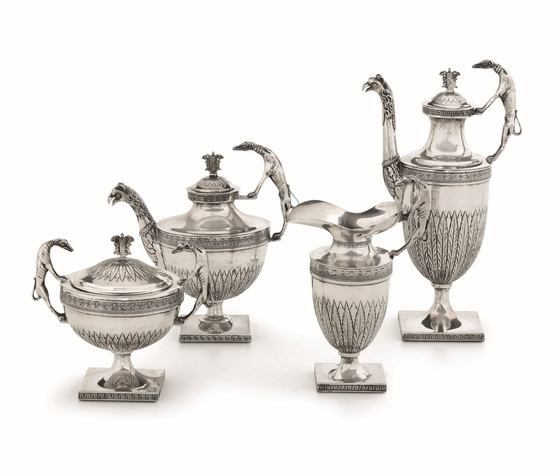 A silver tea and coffee set, Italy, 1900s - Molten, embossed and chiselled silver. It [...]