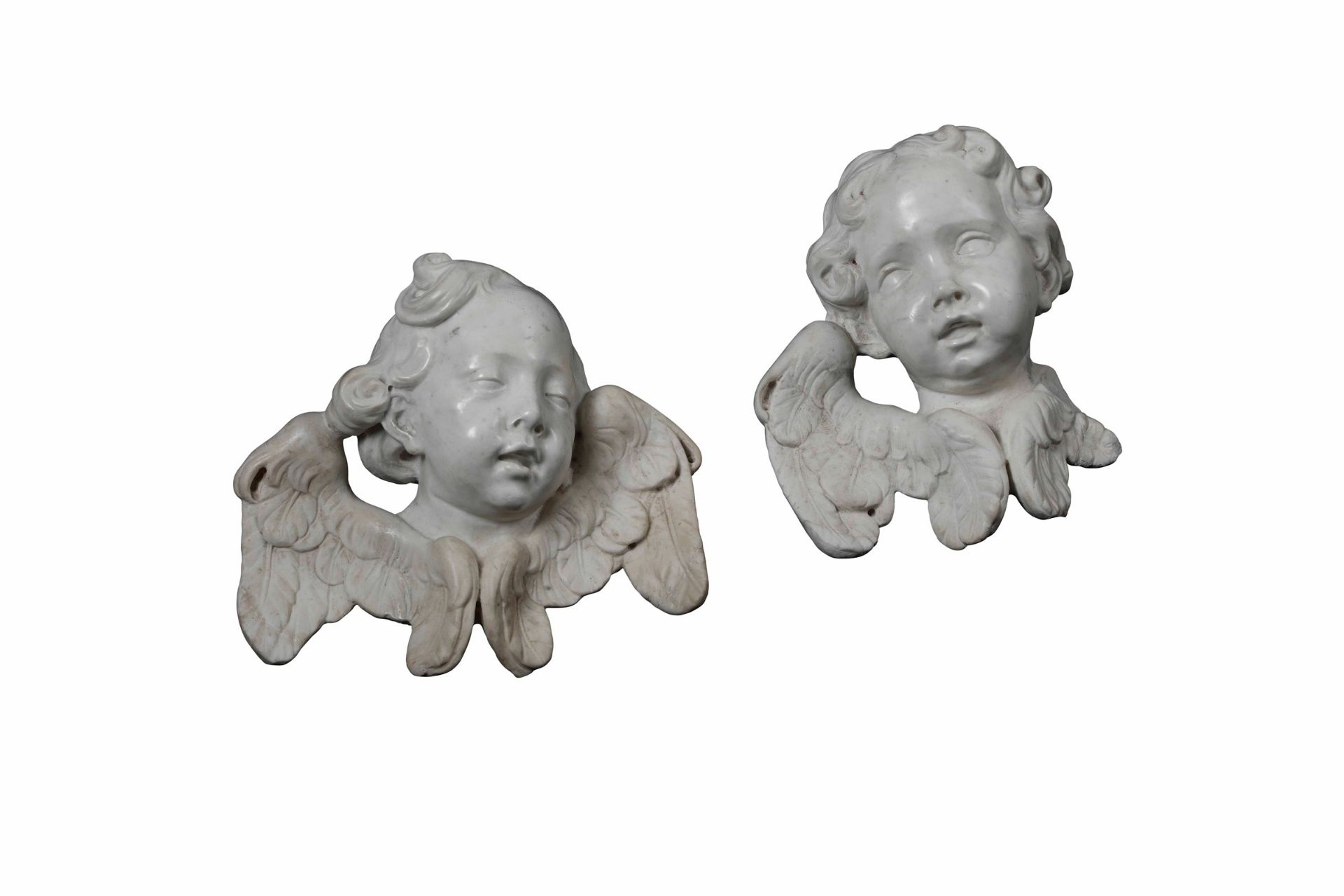 Coppia di teste di cherubini in marmo bianco. Scultore barocco italiano del XVIII [...]