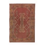 Raro tappeto Ungherese, fine XIX secolo, - campo mattone con medaglione centrale [...]