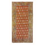 Tappeto Hotan, est Turkestan inizio XX secolo, - campo arancione con fiori, cm350x180 -