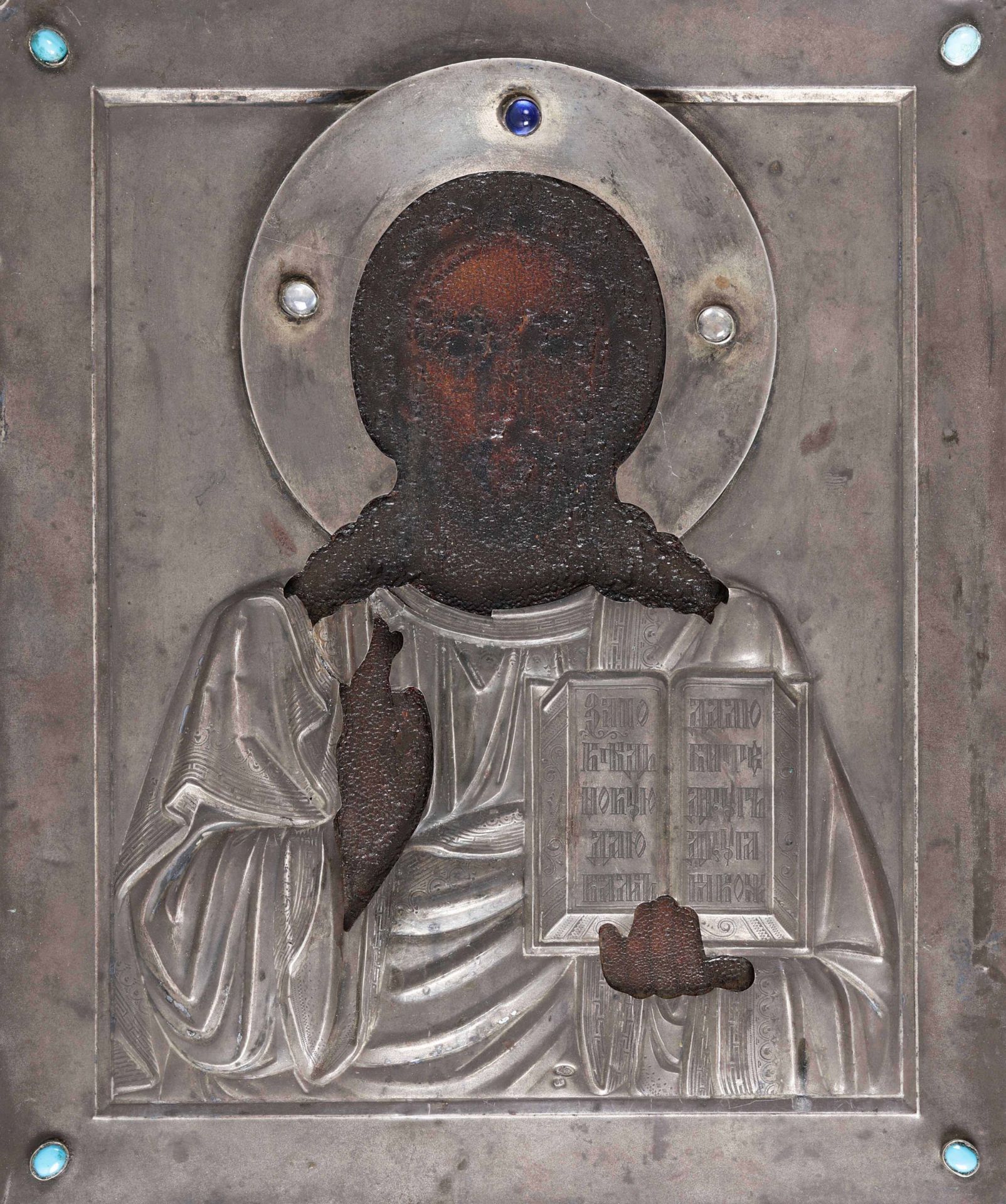 Icona con riza in argento sbalzato, cesellato e pietre cabochon raffigurante Cristo [...]