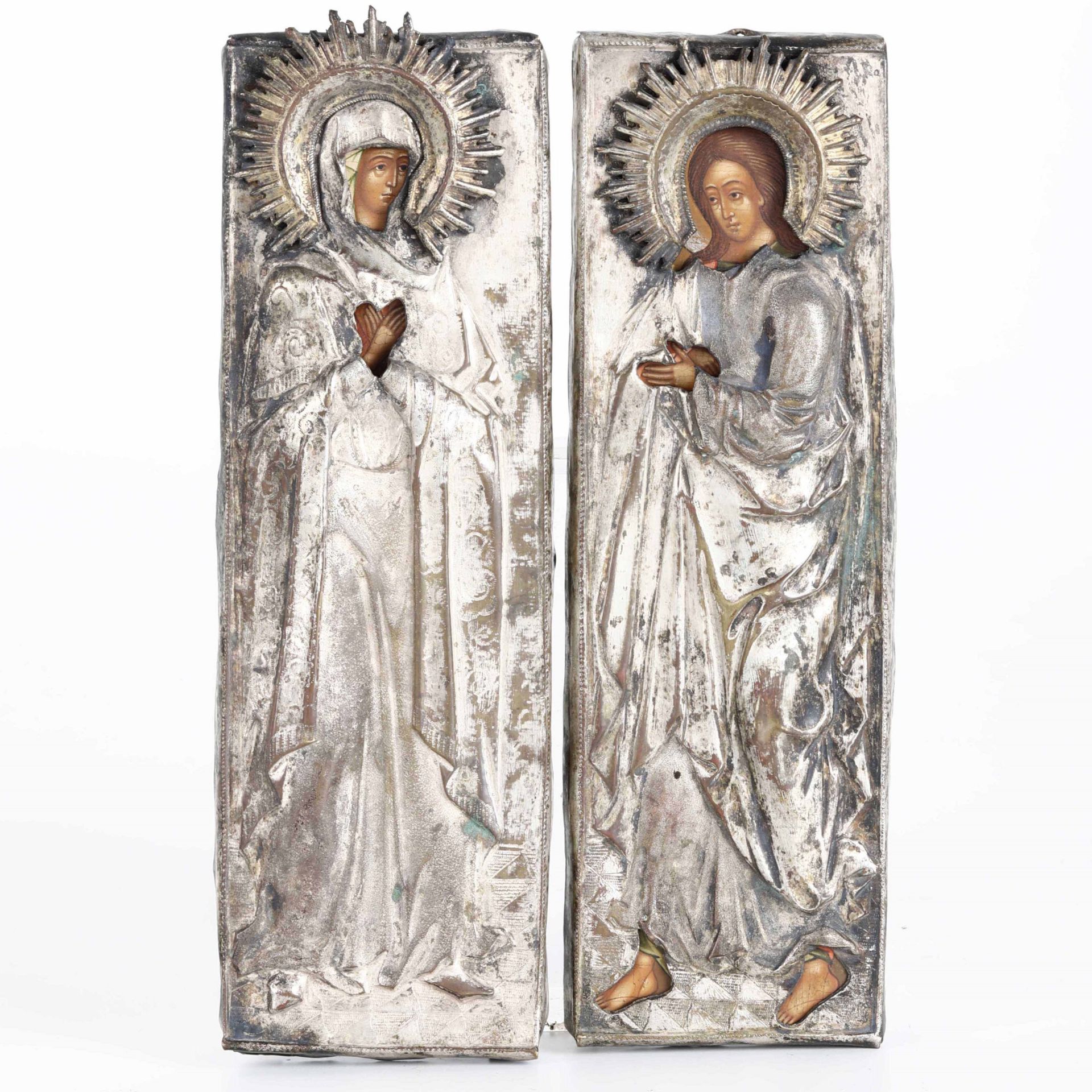 Due piccole icone con riza in metallo argentato raffiguranti Maria Maddalena e [...]