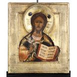 Icona con riza in metallo dorato e pietre cabochon raffigurante Cristo Pantocrator. [...]