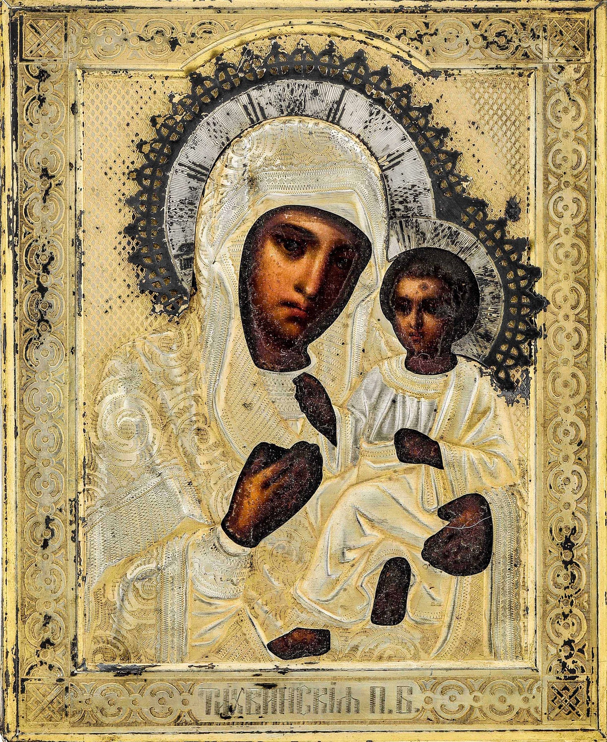 Icona raffigurante la Vergine di Kazan. Riza in argento sbalzato, traforato, [...]