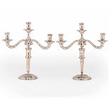 Two silver candlesticks, 1900s, L. Calegaro - Two silver candlesticks with three [...]