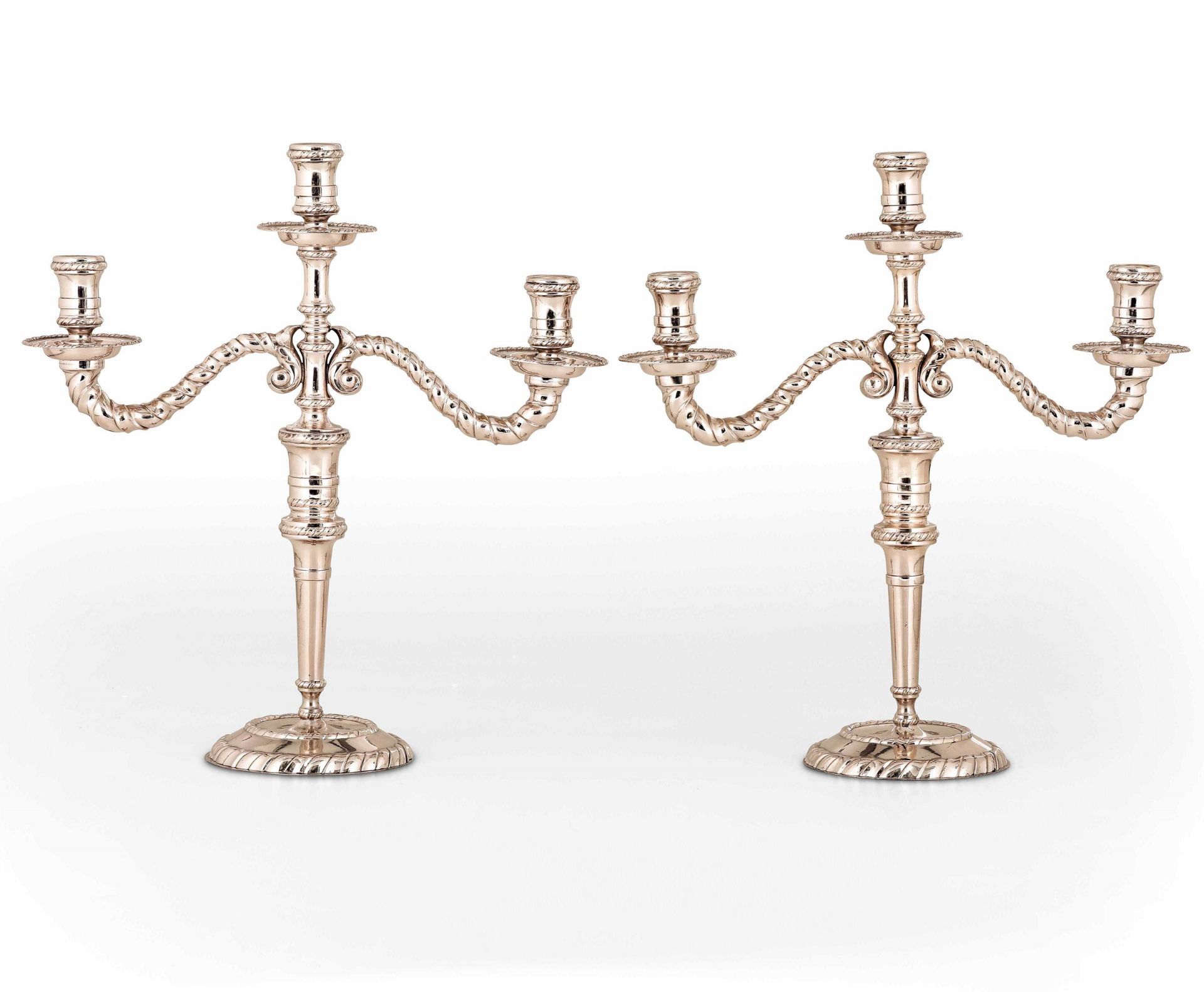 Two silver candlesticks, 1900s, L. Calegaro - Two silver candlesticks with three [...]