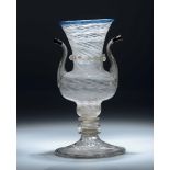 A glass vase, Tuscany, 1700s - Altezza cm 20 Corpo globulare con alto collo svasato, [...]