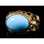 A Turquoise Ring, Modern, in 18ct gold mount, set with an oval cabochon turquoise, 10mm x 15mm, with