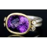 An Amethyst and Diamond Ring, Modern, by Mark Nuell, in 18ct yellow gold and silver mount,