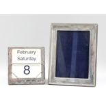 An Elizabeth II Silver Square Desk Calendar and a Rectangular Photograph frame, both by Carr's of