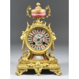 A French Ormolu and Porcelain Mounted Mantel Clock, 19th Century, by H. P. & Co, No. 1458, the 3.