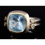 An Aquamarine and Diamond Ring, Modern, by Mark Nuell, in silver mount, set with a square faceted