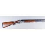 A 12 Bore Over and Under Multichoke Shotgun by Rizzini, Serial No. 53439, the 28ins blued steel