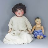 A French SFBJ bisque-headed doll, No. 236, late 19th Century, with blue closing eyes, open mouth
