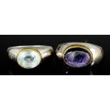 An Aquamarine Ring and an Amethyst Ring, both Modern, both in silver mounts, one set with faceted