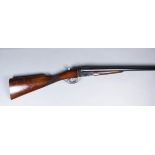 A 12 Bore Side by Side Shotgun by A.Y.A., Serial No. 218074, the 26ins blued steel barrels with