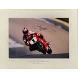 NIGEL SNOWDON (1934-2013) - Cibachrome image - "Carl Fogarty - Ducati", signed by rider, 10.5ins x