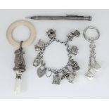 An Elizabeth II Child's Silver Rattle, and mixed silverware, the rattle possibly by W. H.