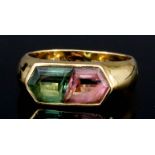 A Tourmaline Ring, Modern, in 18ct gold mount, set with a green and pink facet cut tourmaline,