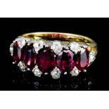 A Ruby and Diamond Ring, 20th Century, in gold coloured metal mount, set with five oval cushion