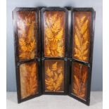 A Stained Wood Framed and Fern Ware Three-Fold Draft Screen, the frame carved with leaf scroll