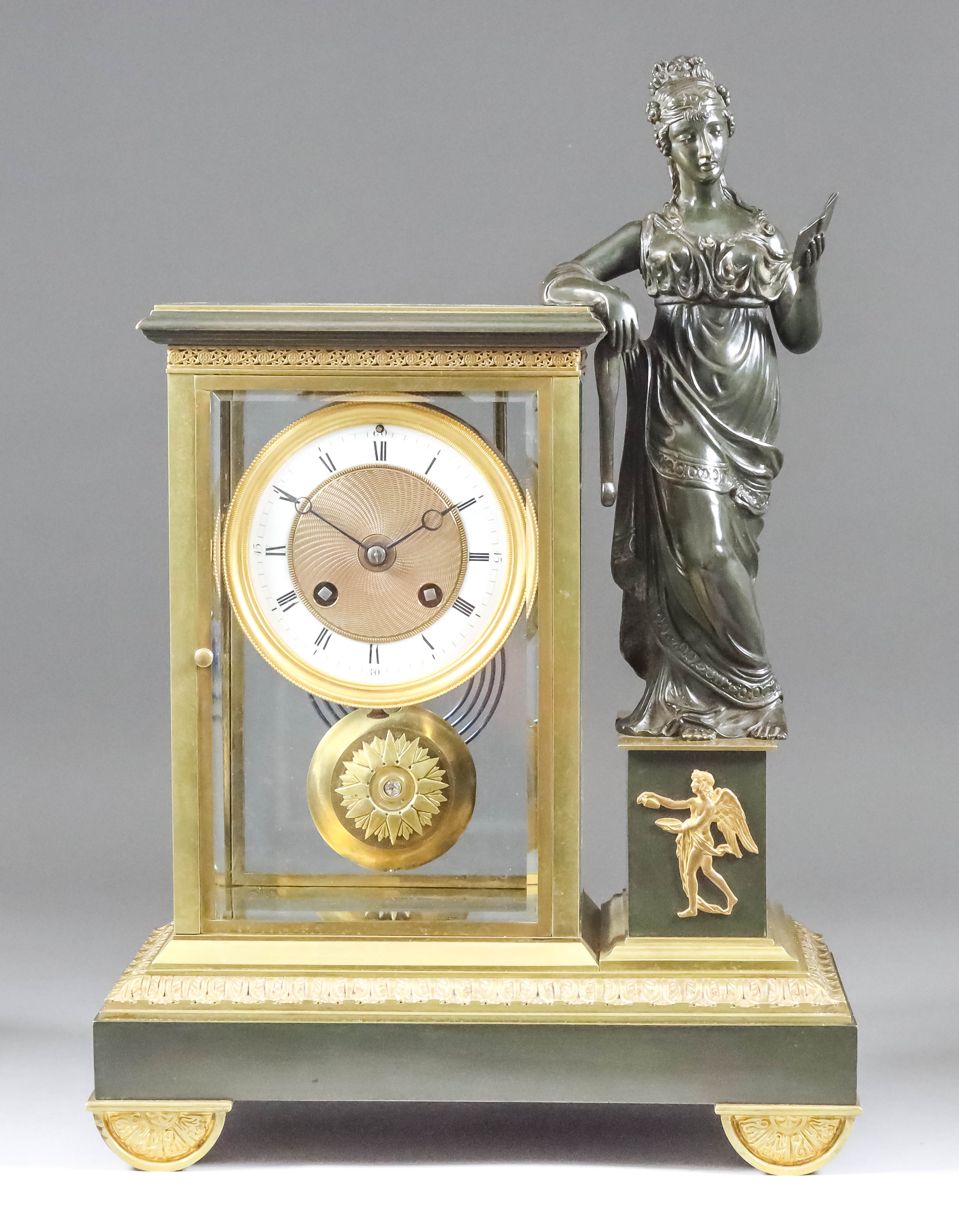 A French Gilt Brass and Bronzed metal "Four Glass" Mantel Clock, Late 19th Century, No. 1543, the