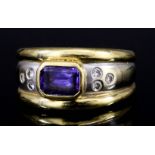 A Tanzanite and Diamond Ring, Modern, in 18ct white and yellow gold mount, set with a rectangular