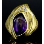 An Amethyst and Diamond Ring, Modern, in 18ct gold mount, set with a shaped cabochon amethyst,